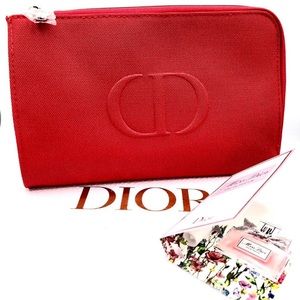 Dior miss dior parfum sample and a red cosmetic bag